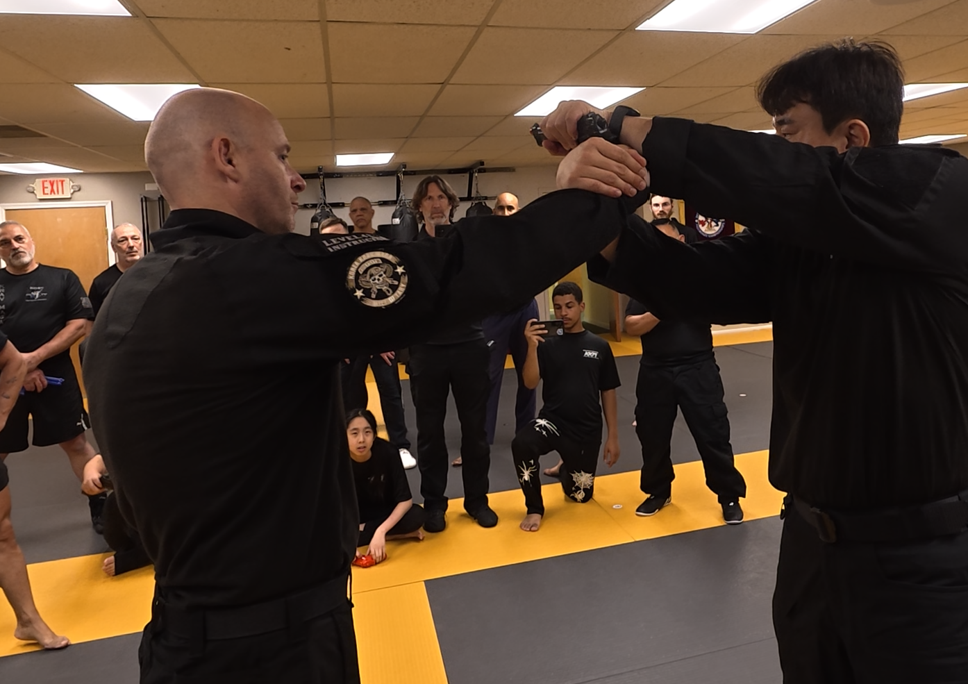 KKM Krav Maga students and instructors training together in class